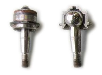 A whole ball joint beside a cutaway: stud, steel ball in a socket, rubber boot, and the housing that bolts to the control arm