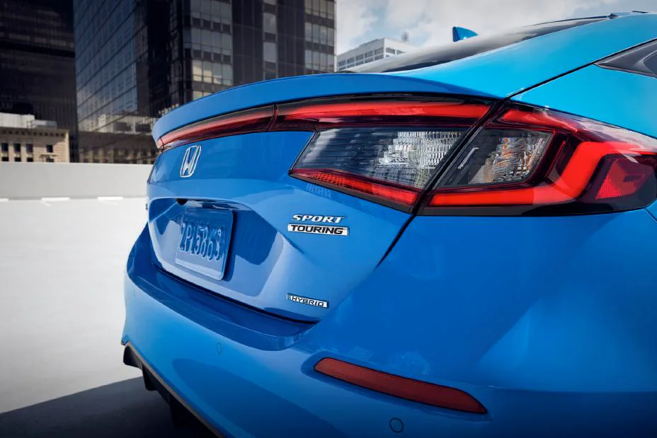 Sport Touring and Hybrid badges on a 2025 Honda Civic Hatchback