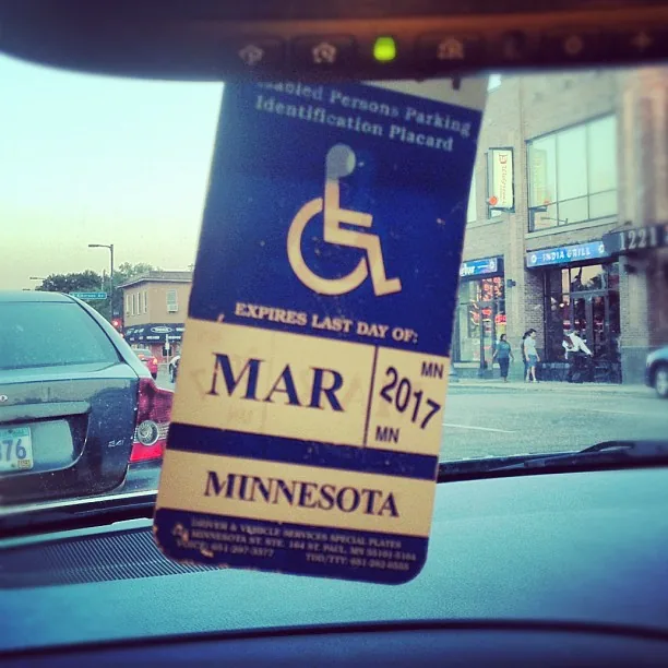 Historical Minnesota disabled-parking placard with March 2017 expiration