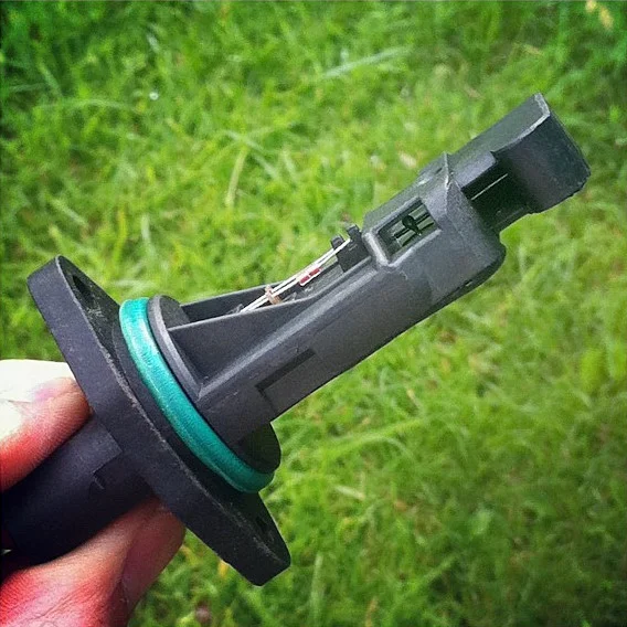Bosch hot-film mass airflow insert with a teal O-ring and an open window over the sensing element