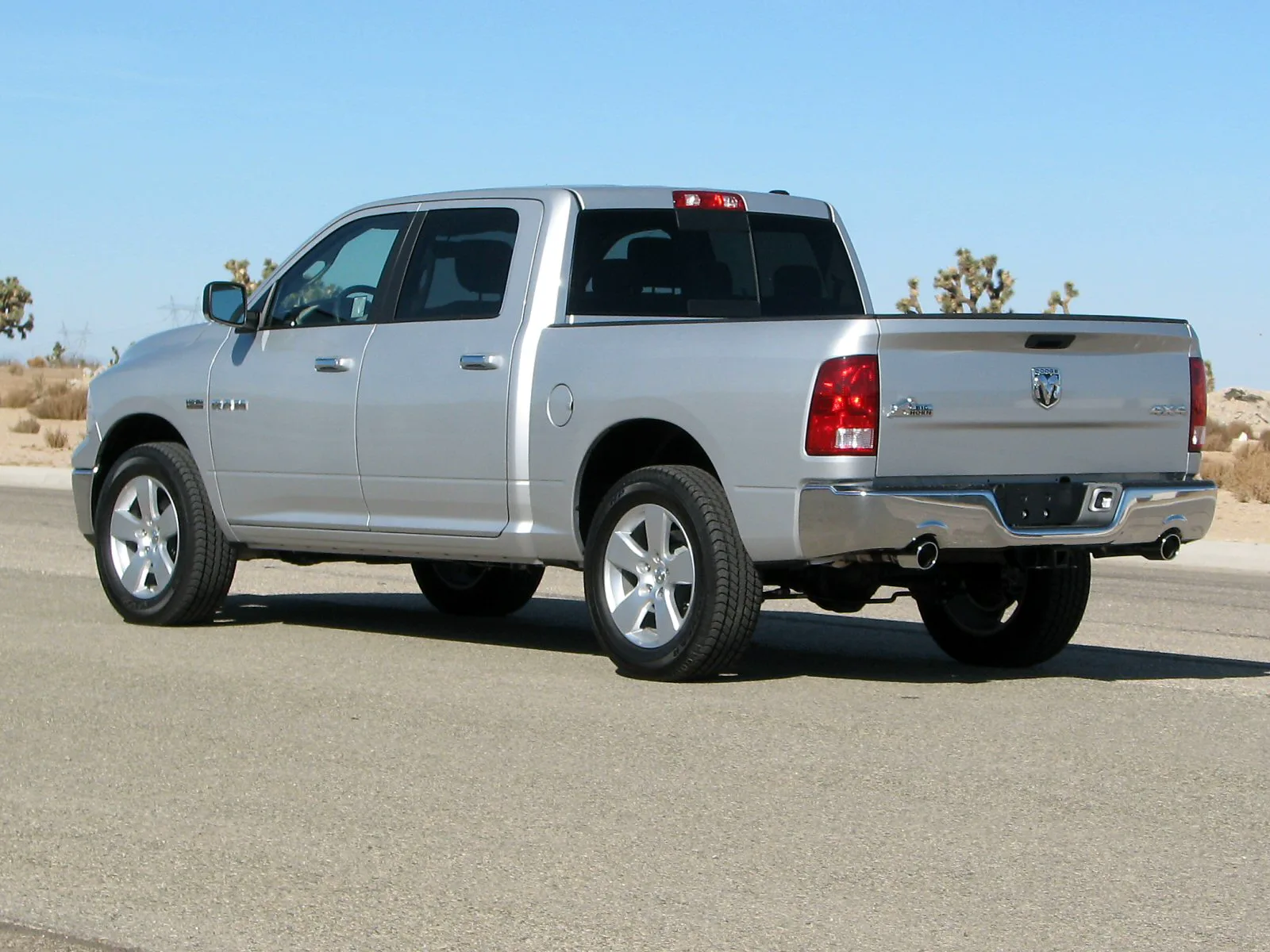 Silver Ram 1500 pickup with a 4x4 badge on the tailgate