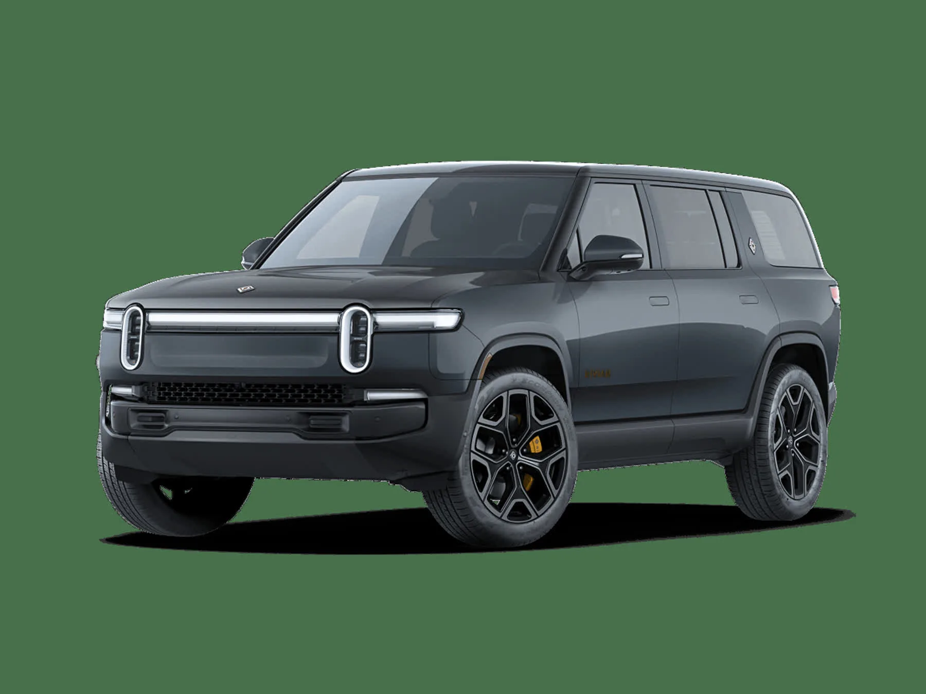 Dark 2026 Rivian R1S, studio front three-quarter with vertical stadium lamps and a full-width light bar