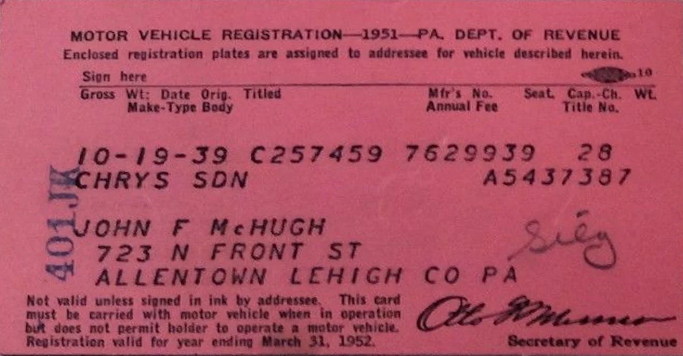 A pink card headed MOTOR VEHICLE REGISTRATION—1951—PA. DEPT. OF REVENUE. Under that, the line Enclosed registration plates are assigned to addressee for vehicle described herein, then a Sign here rule. Typed entries include 10-19-39, C257459, 7629939, 28, CHRYS SDN, and A5437387. A blue vertical stamp reads 401JK. The name and address read JOHN F McHUGH, 723 N FRONT ST, ALLENTOWN LEHIGH CO PA. The bottom reads Not valid unless signed in ink by addressee. This card must be carried with motor vehicle when in operation but does not permit holder to operate a motor vehicle. Registration valid for year ending March 31, 1952. A handwritten signature is on the right, and a printed signature sits above the words Secretary of Revenue.